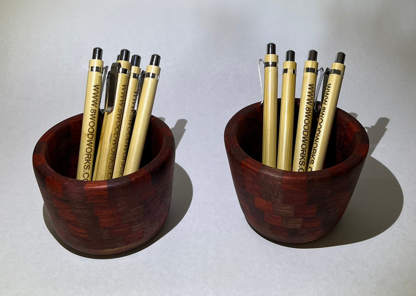 Set of 2 segmented mini pen/pencil jars made from Purple Heart and BloodWood.