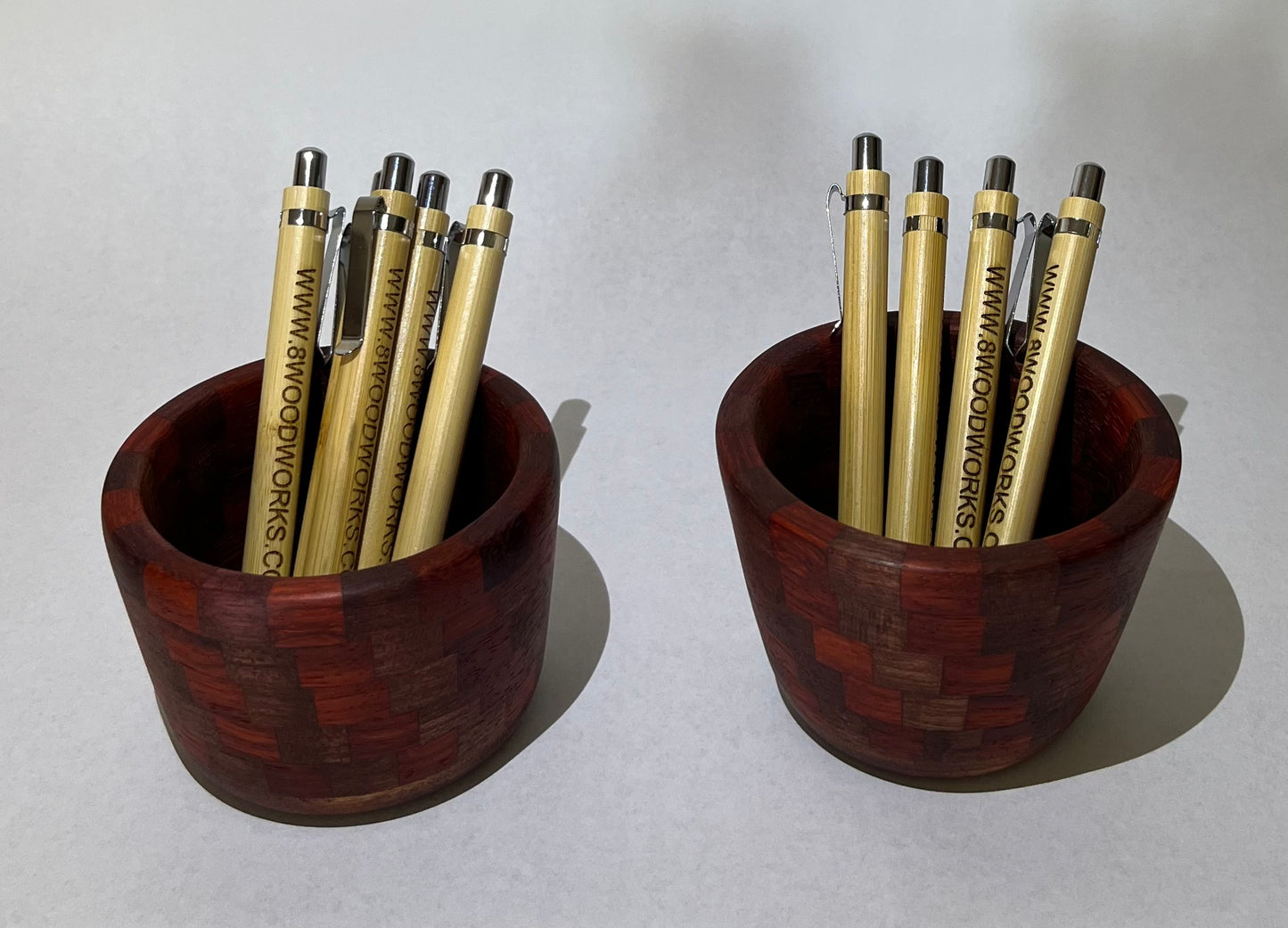 Set of 2 segmented mini pen/pencil jars made from Purple Heart and BloodWood.